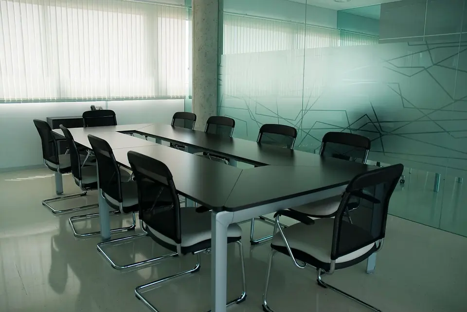 Modern glass wall partition in an office conference room