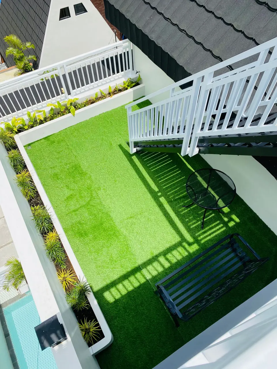 Aerial view of a rooftop terrace fitted with artificial grass turf