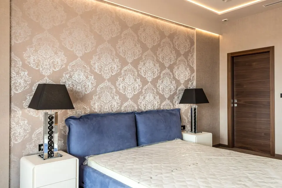 Elegant designer wallpaper accent wall in a modern bedroom