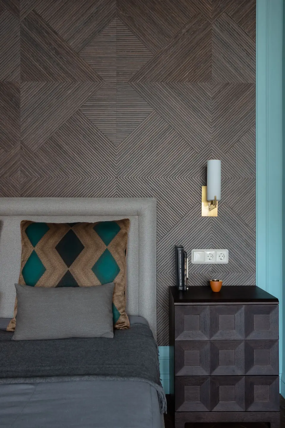 3D textured geometric patterned wallpaper accent wall in a bedroom